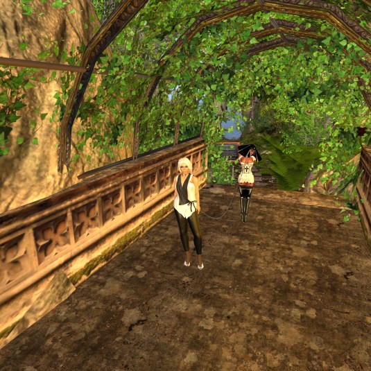 Feb 25th: Diomita and slave Flo in the tunnel between "The Garden Conservatory and Spa" and "((The Nameless Cafe))"