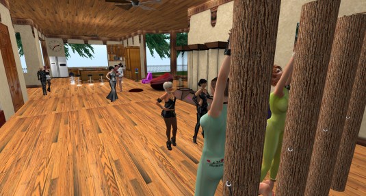 Mistress Jenny and Diomita testing the bondage posts at Judie's with slave cecy and slave Pauline