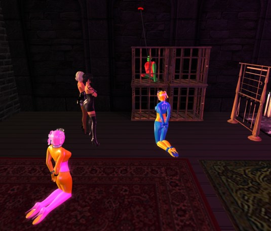 Jan 23rd: Mistress Jenny and Diomita locking slave D in the Kennels, slaves Flo and cecy watching