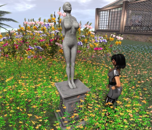 Feb 25th at home: Mistress Jenny  looking at the statue of slave slut cecy (not drippin' anymore btw.) 
